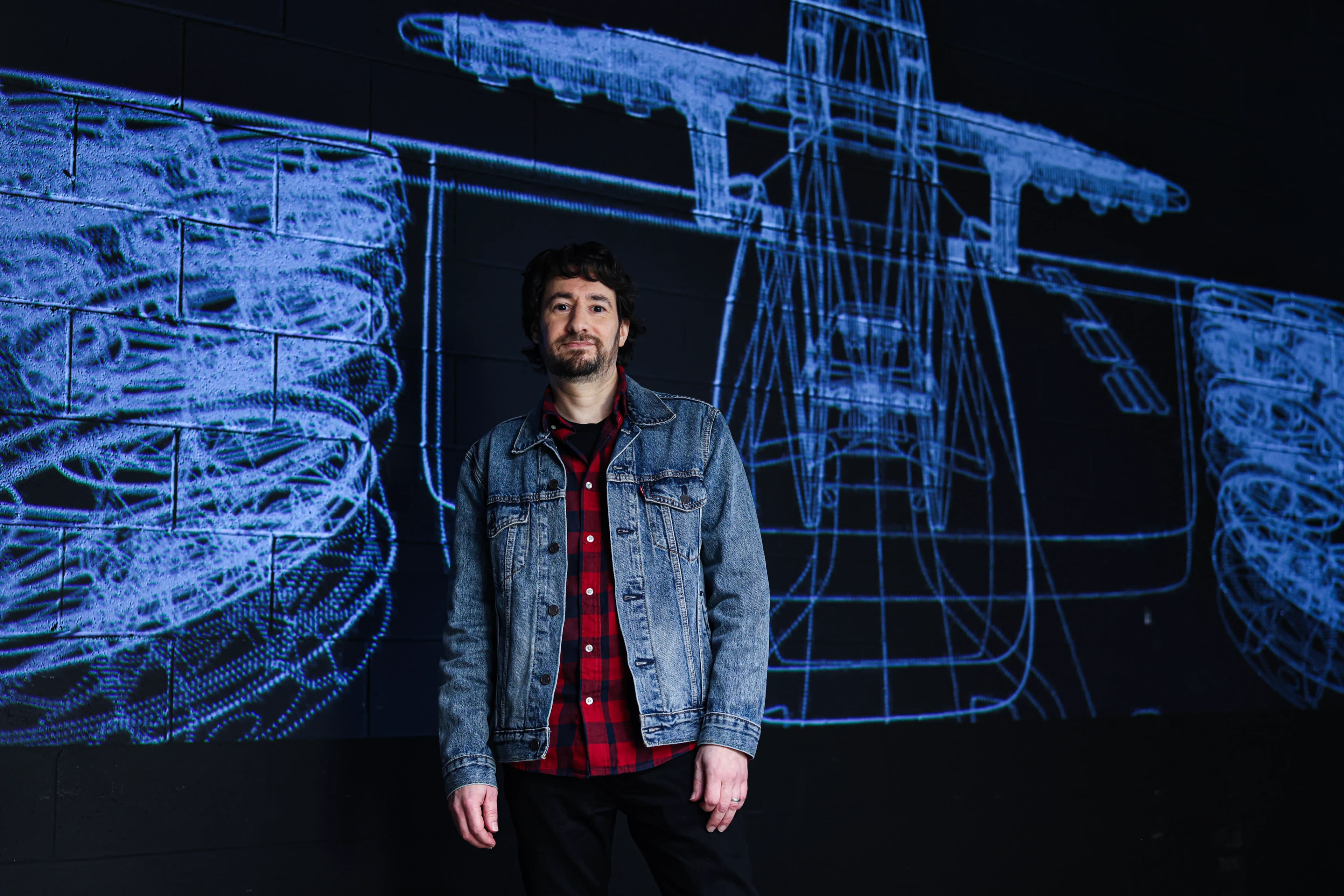 human flying designer Carlos
